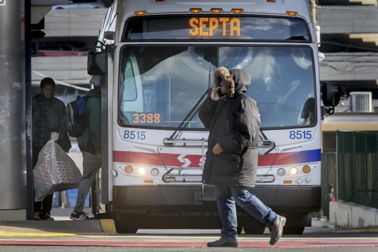 File Photo: A SEPTA bus picks up passengers.