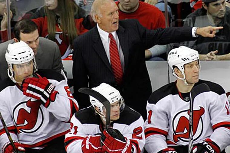 Jacques Lemaire and the Devils visit the Wells Fargo Center Saturday afternoon to play the Flyers. (AP file photo)