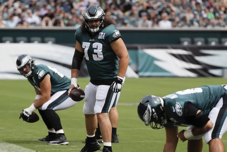 Eagles offensive guard Isaac Seumalo watches his teammates perform center position drills during a open practice at Lincoln Financial Field in South Philadelphia on Saturday, August 11, 2018. YONG KIM / Staff Photographer