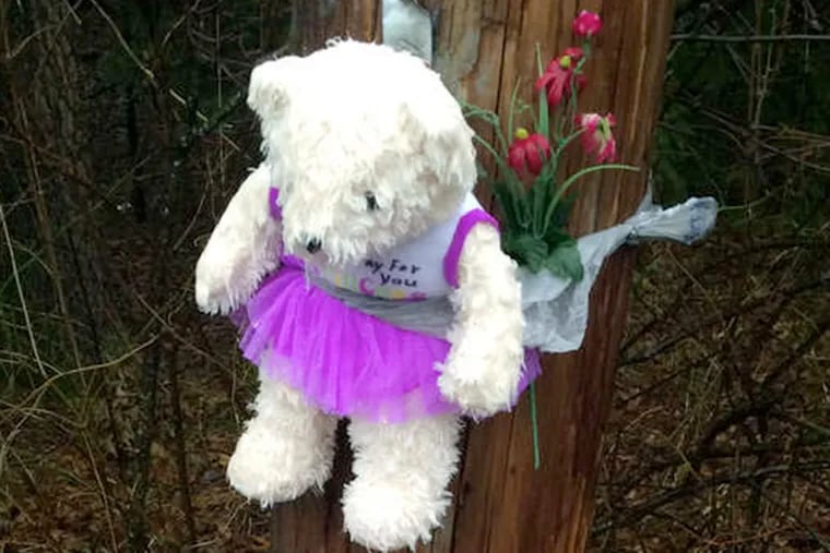 Pemberton Township residents put up this memorial on Simontown Road for a baby who was killed when her mother allegedly doused her with an accelerant and set her afire.