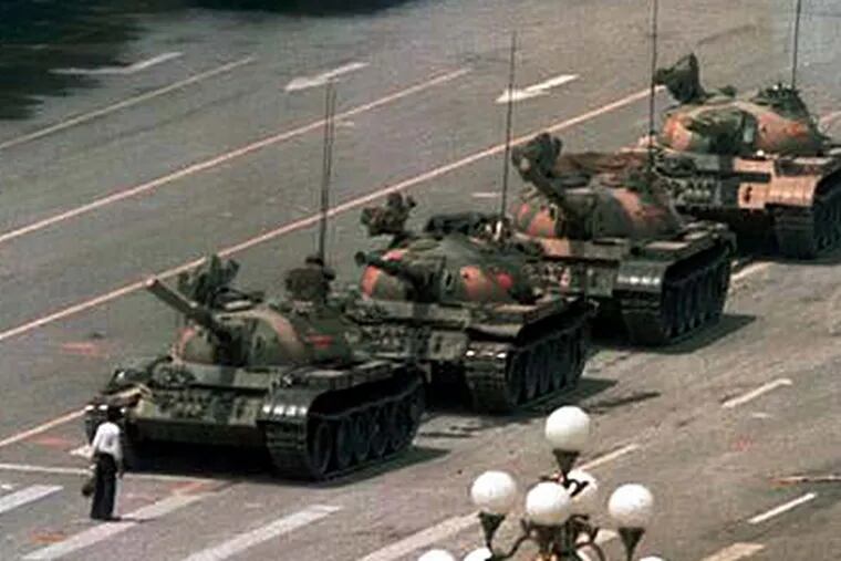 Tankman facing down a line of Chinese tanks on Tiananmen Square nineteen years ago.