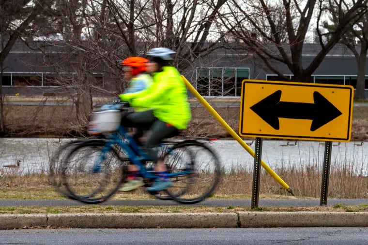 Bicycles pedal on South Park Drive along the Cooper River in Collingswood Thursday, Mar. 2, 2023, the mildest day of the week.