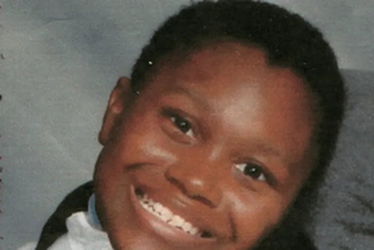 Jabar Wright, seen in his latest school photo, was shot and paralyzed when he was 6.