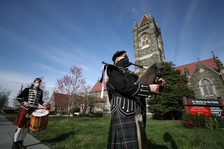 Corey Purcell (left )and Charlie Richard play outside St. Martin-in-the-Fields Episcopal Church in Chestnut Hill on Sunday before parading through the neighborhood performing traditional Easter hymns.