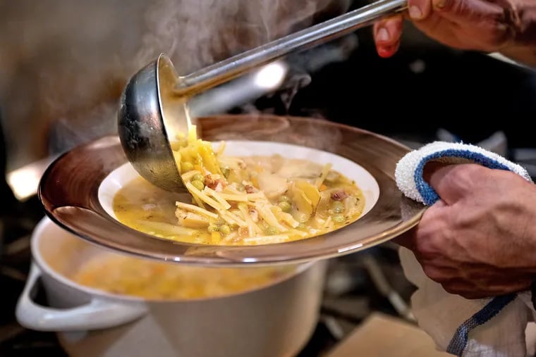 The "summer soup" is ladled into a bowl for serving, as Sapori Trattoria Italiana owner-chef Franco Lombardo prepares his pasta rustica (half soup, half pasta) in the Collingswood restaurant.