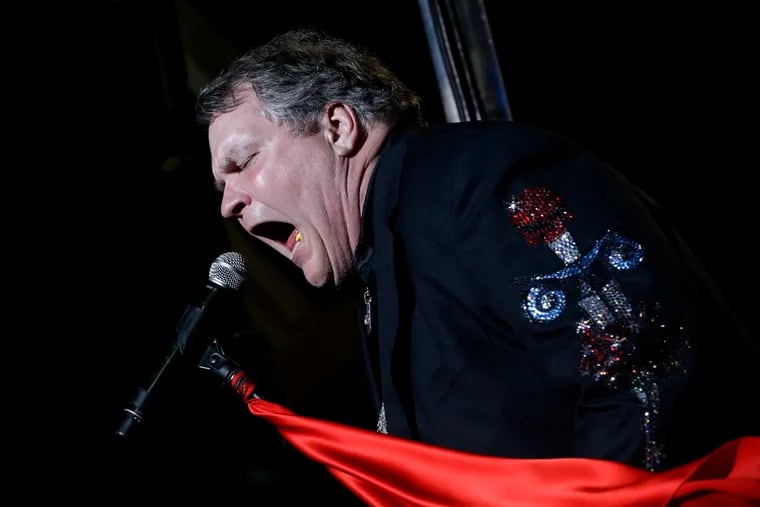 Singer Meat Loaf performs in support of Republican presidential candidate and former Massachusetts Gov. Mitt Romney at the football stadium at Defiance High School in Defiance, Ohio, Thursday, Oct. 25, 2012. Meat Loaf, whose "Bat Out Of Hell" album is one of the all time bestsellers, has died, family said on Facebook, Friday, Jan. 21, 2022.