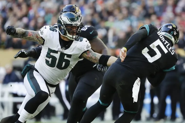 A Malcolm Jenkins blitz forced Jacksonville quarterback Blake Bortles (right) into the arms of Ethe Eagles' Chris Long, who took him down with a sack in the first quarter.
