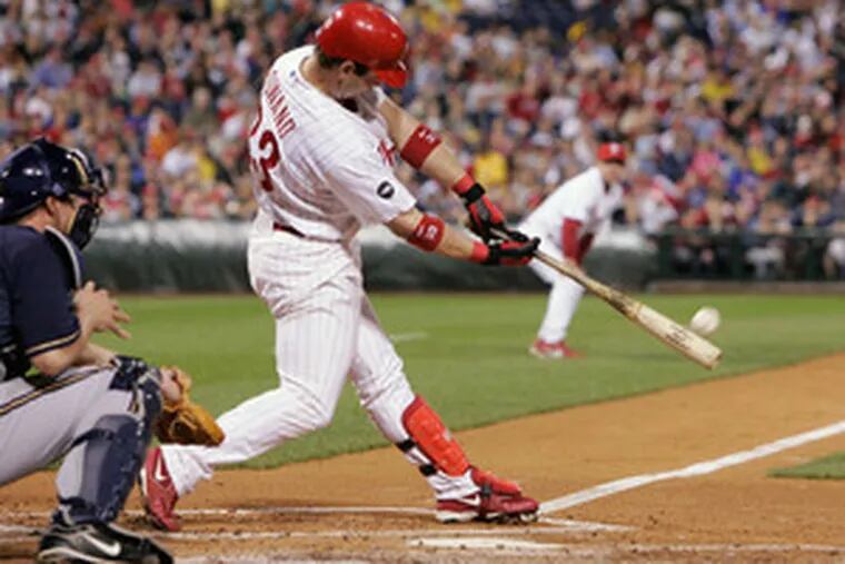 Aaron Rowand connects for a three-run homer in the second inning, giving the Phillies a 5-0 lead.