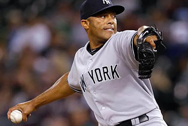 Yankees closer Mariano Rivera notched his record-tying 601st save of his career Saturday. (Elaine Thompson/AP)