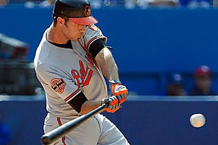 Orioles' J.J Hardy connects on an RBI-single Monday against the Blue Jays. (Chris Young/AP/The Canadian Press)