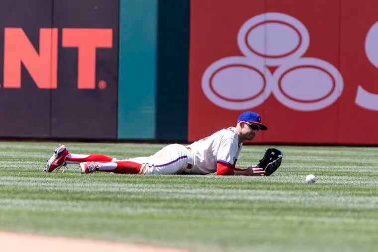 Phillies third baseman Brad Miller failed to catch a ball hit by the Nationals' Victor Robles during the fifth inning Wednesday at Citizens Bank Park.