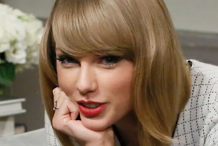 Taylor Swift spoke with public school children about the importance of reading and writing at Scholastic Books offices in New York City on Tuesday.