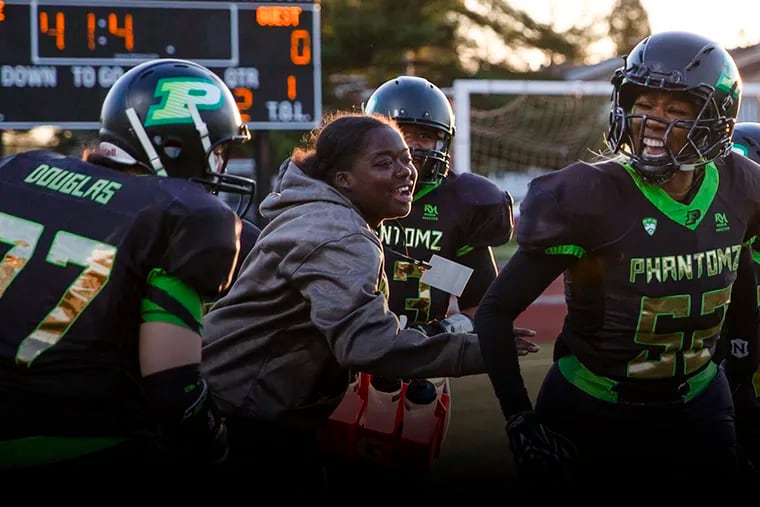 Star Wright (52) is the owner of the Philly Phantomz women's football team.