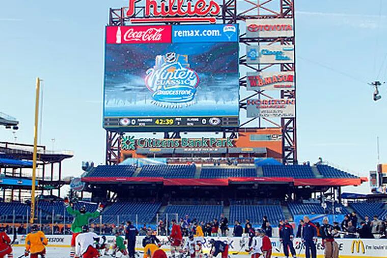 The start time of the Winter Classic was delayed because of a tricky weather forecast. (Tom Mihalek/AP)