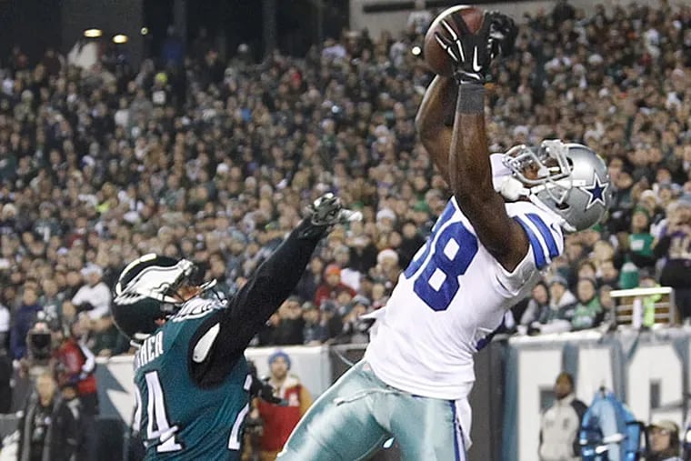 Cowboys receiver Dez Bryant leaps high over Eagles cornerback Bradley
Fletcher to catch a touchdown pass in the first quarter.  (Ron Cortes/Staff Photographer)