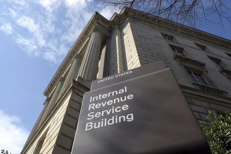 This file photo shows the exterior of the Internal Revenue Service building in Washington. (AP Photo/Susan Walsh)