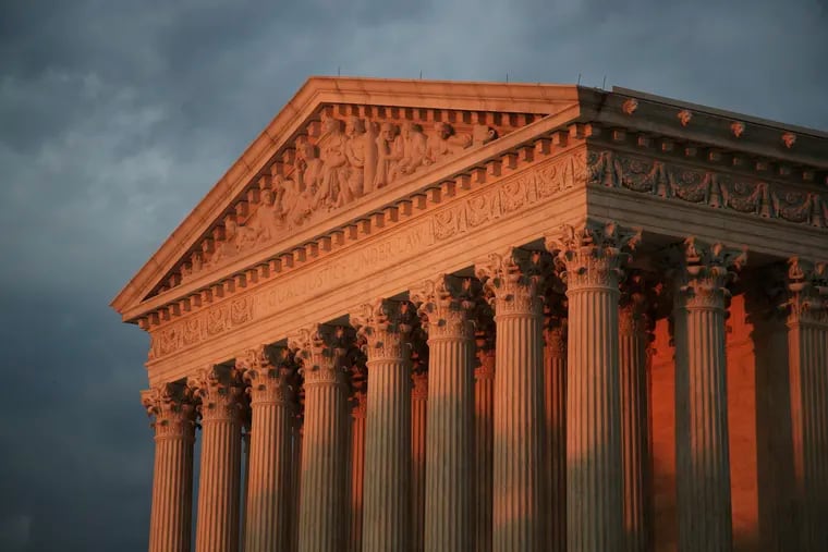 In this Oct. 4, 2018 photo, the U.S. Supreme Court is seen at sunset in Washington.   The Supreme Court is avoiding a high-profile case by rejecting appeals from Kansas and Louisiana in their effort to strip Medicaid money from Planned Parenthood over the dissenting votes of three justices.  (AP Photo/Manuel Balce Ceneta)