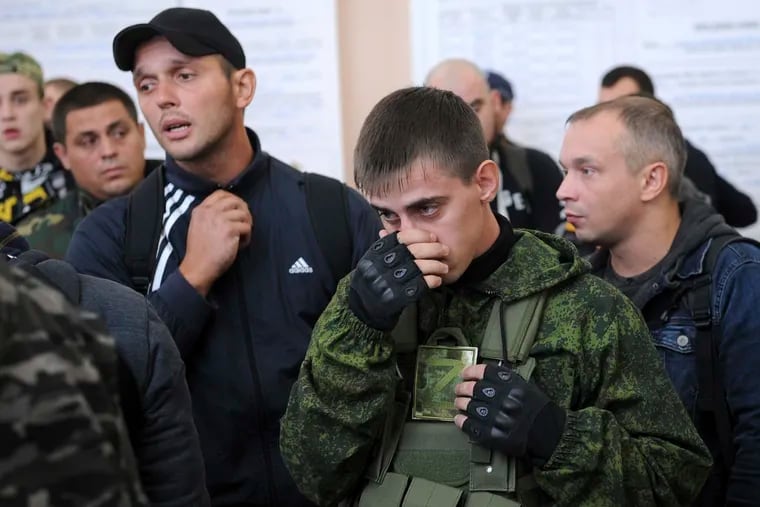 Russian recruits gather inside a military recruitment center of Bataysk, Rostov-on-Don region, south of Russia on Monday.