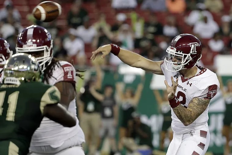 Temple quarterback Logan Marchi (12) throws a pass against South Florida during the first half of an NCAA college football game Thursday, Sept. 21, 2017, in Tampa, Fla.