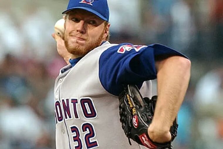 If the asking price for Halladay is too high, the Phils may consider trading for, Cliff Lee, Jarrod Washburn, or Erik Bedard.     (AP Photo/Gail Burton)