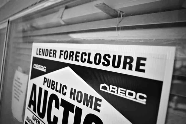 A sign advertising a public auction for a foreclosed home in Las Vegas.