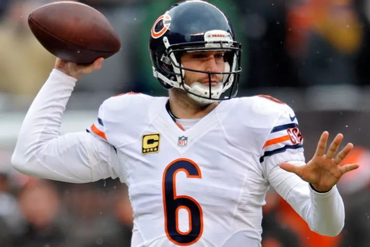 Bears quarterback Jay Cutler passes against the Cleveland Browns in the first quarter of an NFL football game Sunday, Dec. 15, 2013, in Cleveland. (David Richard/AP)