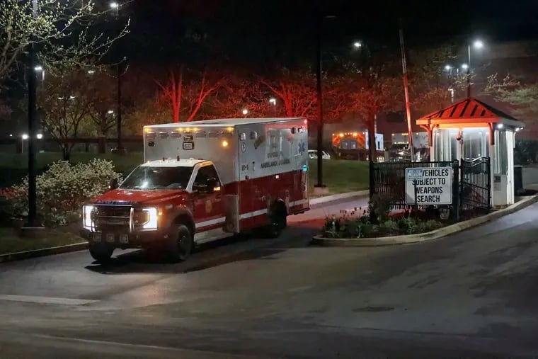 A Union Fire Company ambulance exits through Lincoln University’s main gate shortly after 1 a.m. Sunday after two women, who were not students, were shot during an event. The search continued for the shooter.