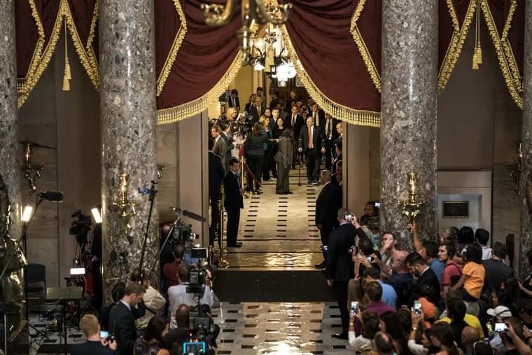 House Majority Whip Steve Scalise (R., La.), accompanied by his wife, walks through National Statuary Hall to his office on his return to Capitol Hill after being critically wounded by a gunshot 15 weeks ago.
