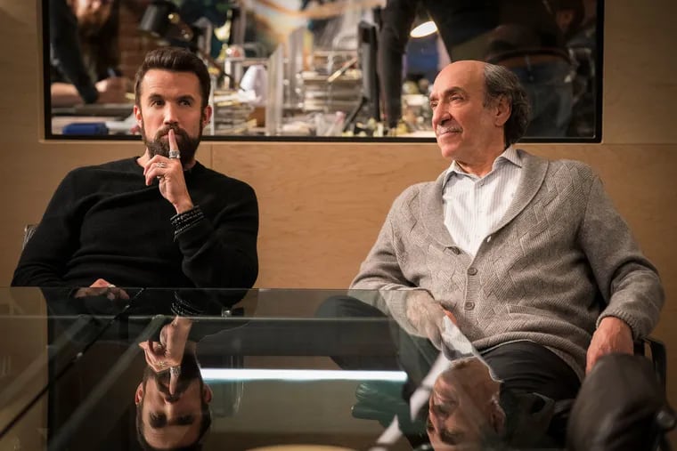 Rob McElhenney (left) and costar F. Murray Abraham in a scene from the first season of their Apple TV+ series "Mythic Quest." The second season starts Friday, May 7.