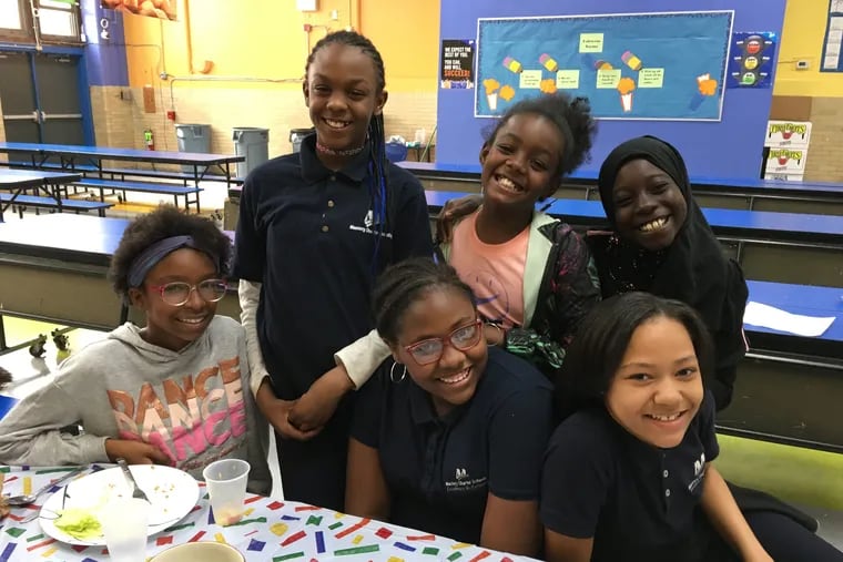 From left, back row, Zayanna Washington, Jalissa Huff, Bianca Simpkins, Maleeah Carter, Cashay McGill and Amy Diallo are having fun and learning new cooking skills in My Daughter's Kitchen cooking program.