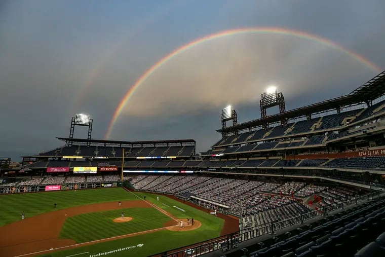 The Phillies' Rhys Hoskins bats against the Nationals' before hitting a first inning solo home under a rainbow at Citizens Bank Park last August.