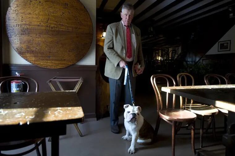 &quot;It&#0039;s going to be a long, uphill struggle,&quot; Christopher Getman, president of the club&#0039;s board, said of efforts to reopen Mory&#0039;s. He and Yale mascot Handsome Dan are shown inside the club, which has temporarily closed and laid off its employees.