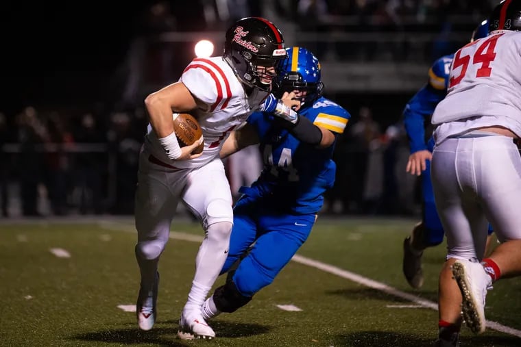 Coatesville quarterback Ricky Ortega, shown here earlier this season vs. Downingtown West, led the Red Raiders to a state-record 49 points in the second quarter of the playoff opener vs. Souderton.