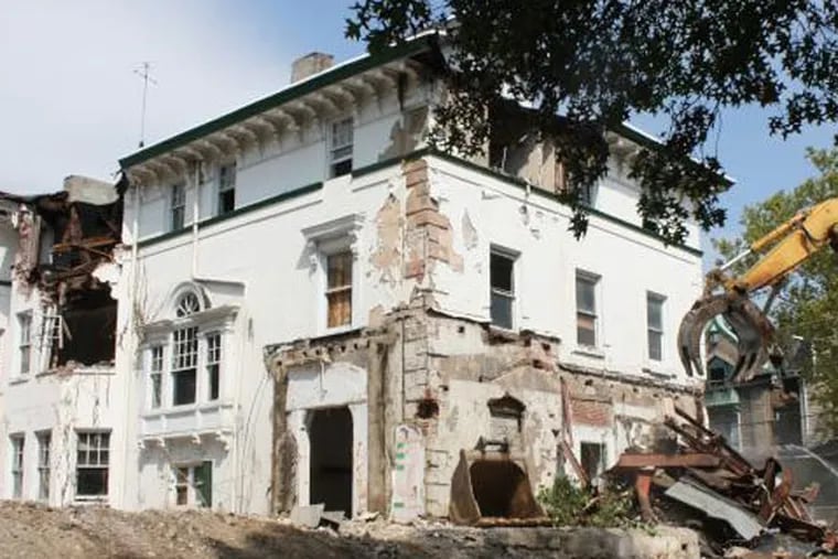 A historic building at the southwest corner of 40th and Pine streets is being demolished to make way for apartments for University of Pennsylvania graduate students. (Photo courtesy of PlanPhilly)