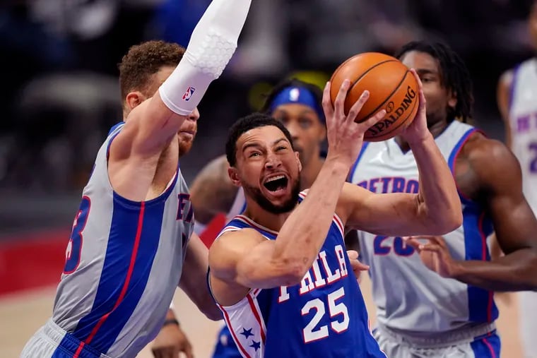 Sixers guard Ben Simmons (25) is defended by Detroit Pistons forward Blake Griffin during the first half.