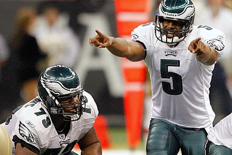 Former Eagles quarterback Donovan McNabb and offensive lineman Shawn Andrews. (Jerry Lodriguss/Staff file photo)