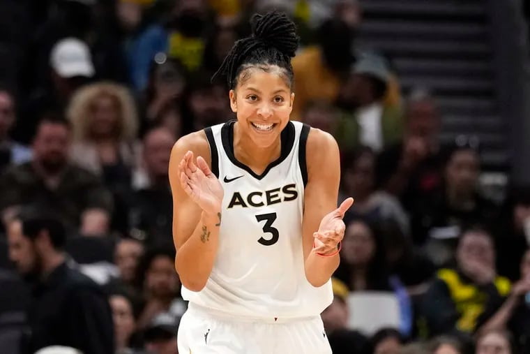 FILE - Las Vegas Aces forward Candace Parker reacts during the first half of a WNBA basketball game against the Seattle Storm, May 20, 2023, in Seattle. The three-time WNBA champion has announced she's retiring. Parker, a two-time league MVP, announced in a social media post on Sunday, April 28, 2024 that she's ending her career after 16 seasons. (AP Photo/Lindsey Wasson, File)
