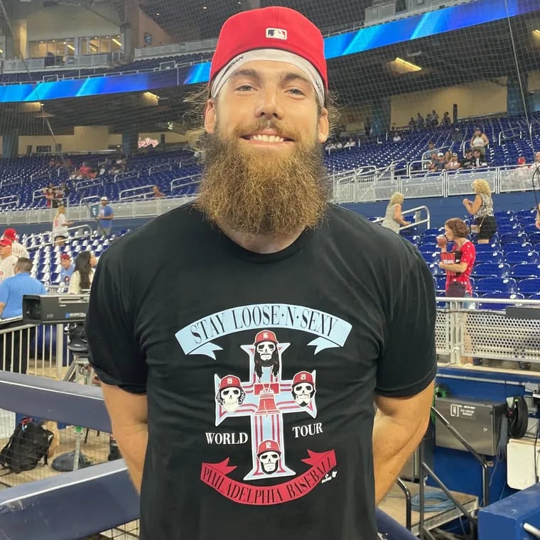 Phillies' Brandon Marsh wears his new “Stay Loose N Sexy” t-shirt in Miami. The shirt was modeled after the Guns N’ Roses cross logo. Guns N’ Roses was Marsh’s late father’s favorite band.