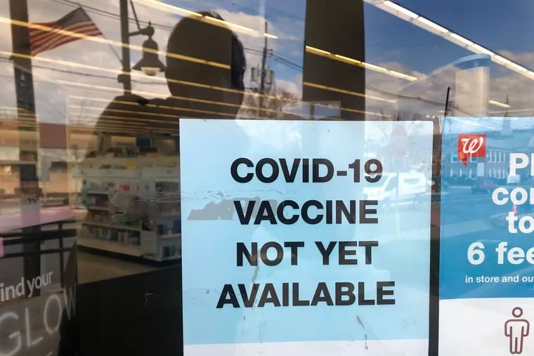 Though they could be on their way soon following recent promising candidate trials, Covid-19 vaccines are not yet available to the public, as this sign at at a chain store pharmasy in Westmont, N.J., notes.