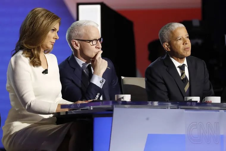 (From left) CNN anchors Erin Burnett and Anderson Cooper, and New York Times national editor Marc Lacey were the moderators of Tuesday's Democratic presidential primary debate hosted by CNN/New York Times at Otterbein University

.