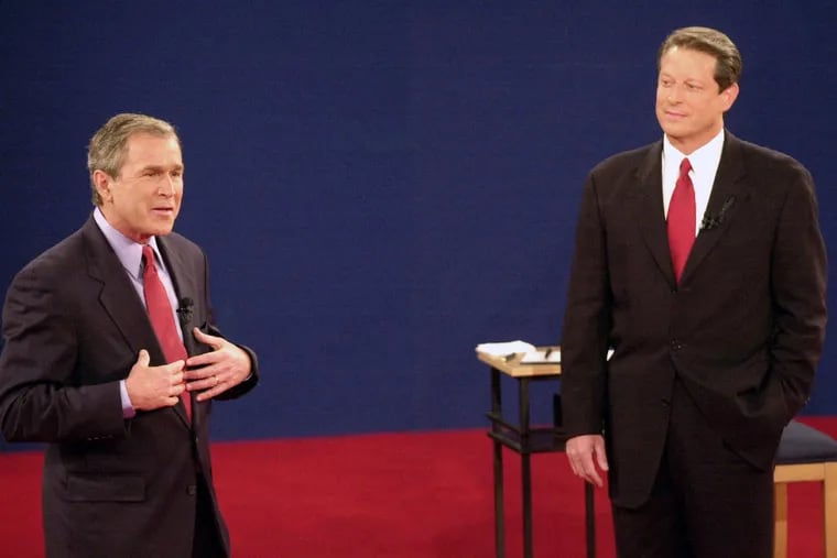 George W. Bush (left) lost the popular vote to Al Gore but won in the Electoral College.