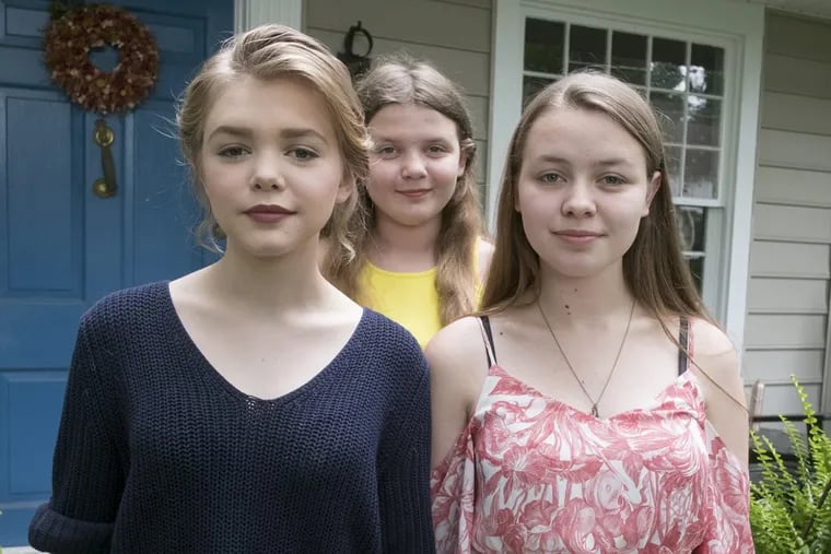 The Minor sisters (from left): Lilly, 14, Violet, 12, and Jane, 16, are students in the Owen J. Roberts School District. Lilly and Jane are in high school and Violet is in middle school; they are opposed to the district dress code they say unfairly targets girls.