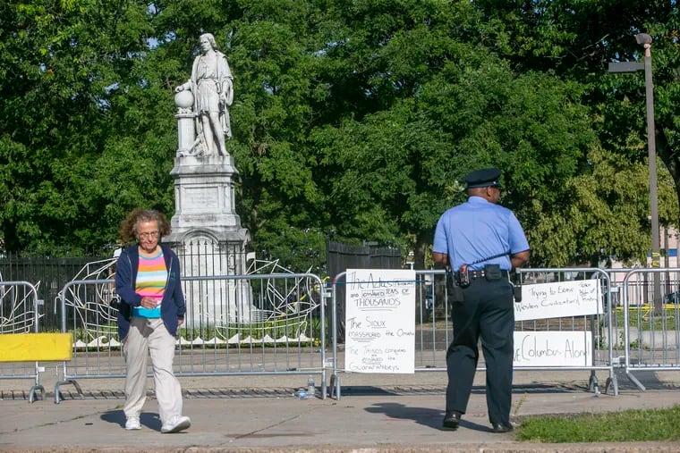 Philadelphia police are guarding the Christopher Columbus statue at Marconi Plaza on Tuesday, June 16, 2020. The statue at the plaza has created heated debate whether is should be removed. Area residents want it to remain where it is.