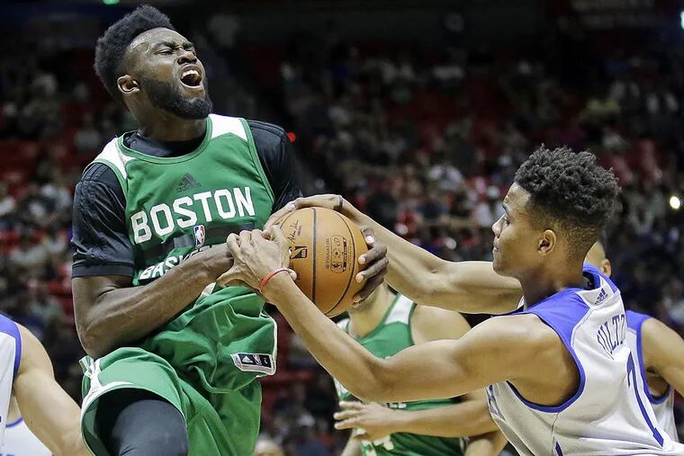 Philadelphia 76ers guard Markelle Fultz (7) defends against Boston Celtics forward Jaylen Brown, left, during the second half of an NBA summer league basketball game Monday, July 3, 2017, in Salt Lake City.
