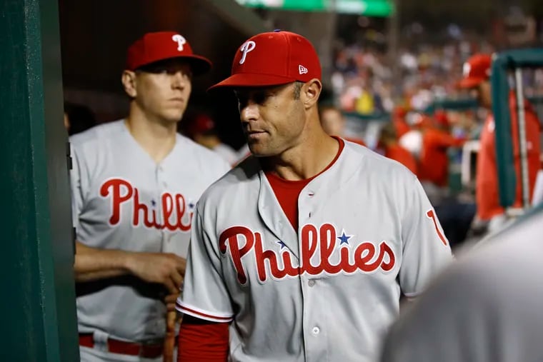 Phillies manager Gabe Kapler walks out of the dugout after Wednesday night's loss.