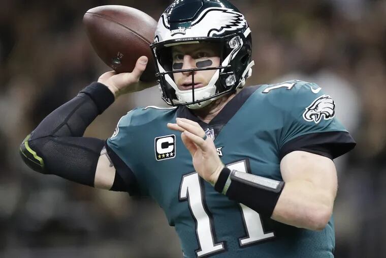 Eagles quarterback Carson Wentz throws the football against the New Orleans Saints on Sunday, November 18, 2018 in New Orleans. YONG KIM / Staff Photographer