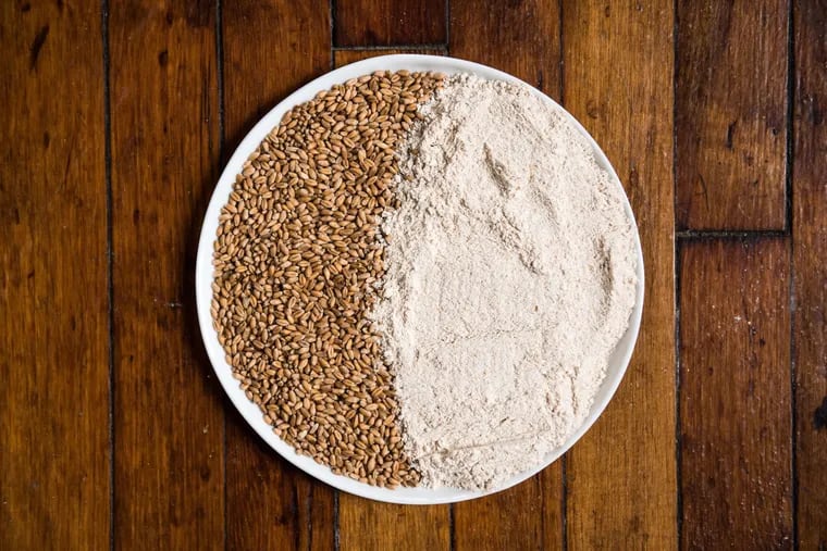 A home mill can turn a cup of hard red wheat, left, into creamy, whole wheat flour, right, in as little as five minutes.