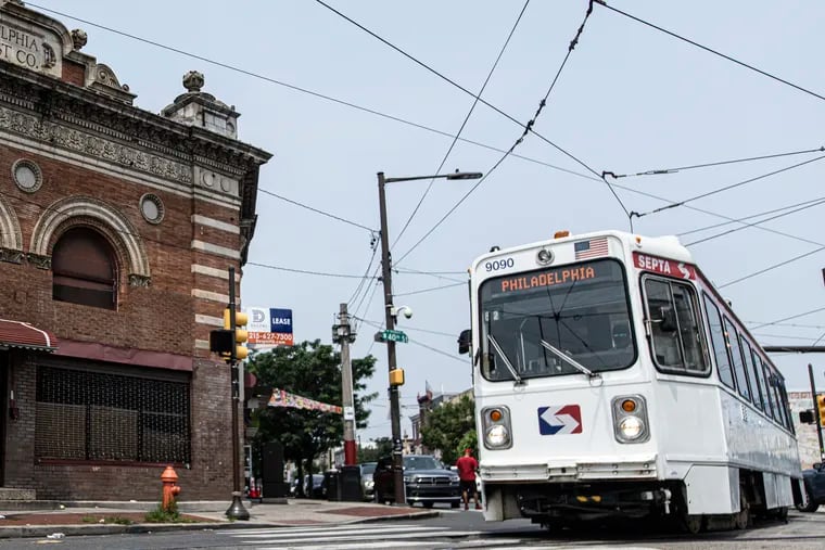 A Route 10 Trolley rides along the 40th block of Lancaster Avenue. As SEPTA reviews bids for a new digital payment system, it is critical that it avoid the mistakes that plagued the original program.