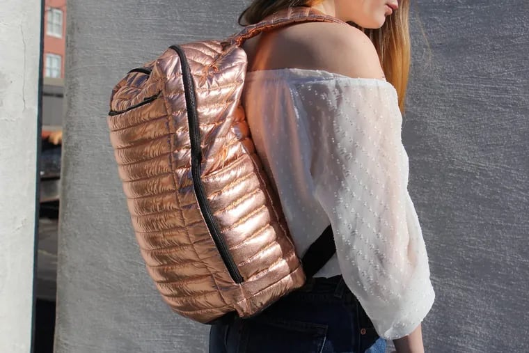 This metallic Think Royln backpack is $158 and available at www.thinkroyln.com.
