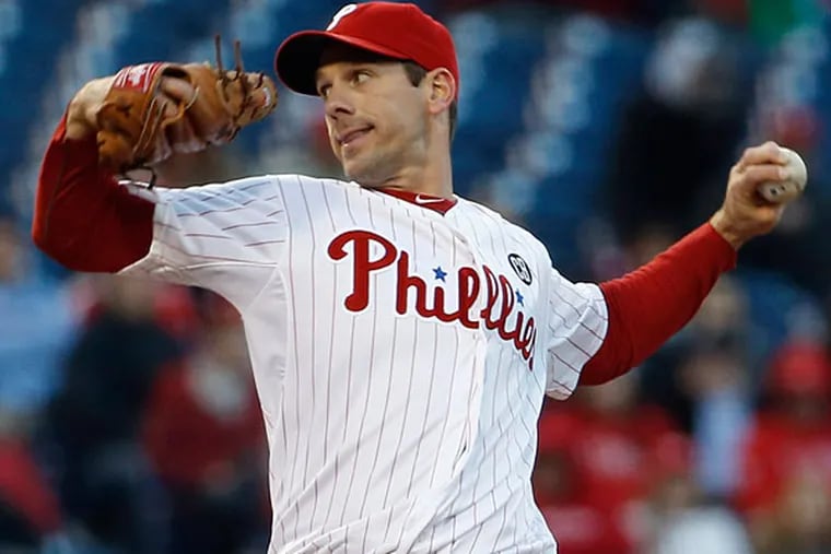 Cliff Lee pitches during the first inning of a baseball game against the Atlanta Braves, Wednesday, April 16, 2014, in Philadelphia. (Matt Slocum/AP)